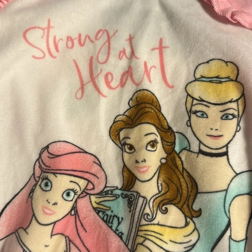 2 piece pajama set pink with Disney princesses on the front of the shirt